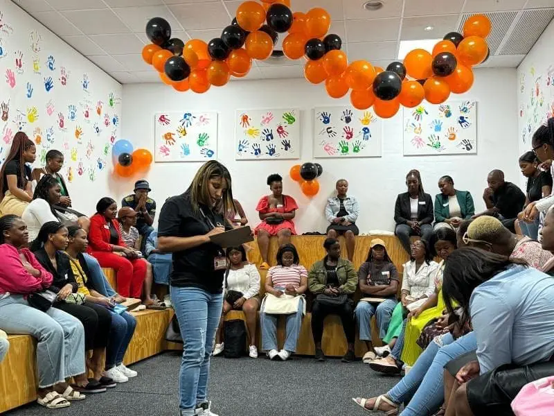 Boomerang staff member presenting an introducing to BPO jobs to group of seated youth