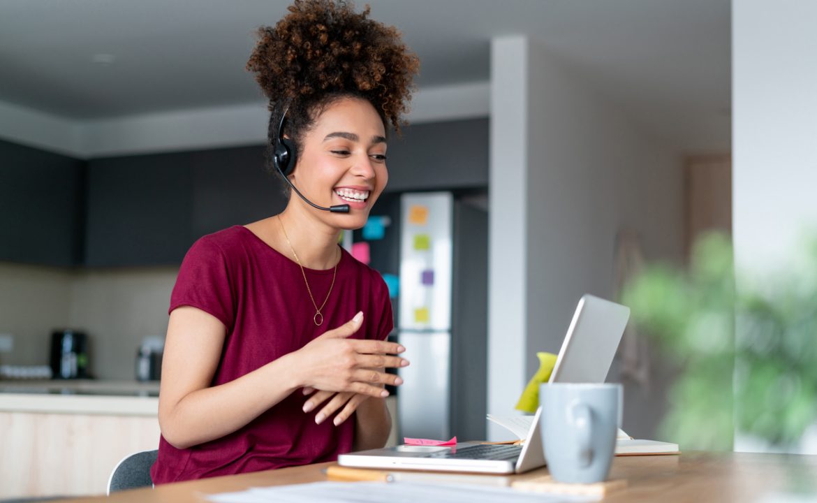 Happy woman working from home as a customer service representative