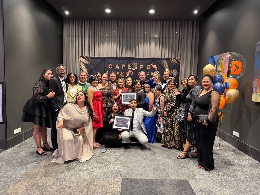 Boomerang Team infront of CapeBPO Awards 2025 Banner